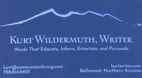 A blue business card with the words " mountain living " on it.